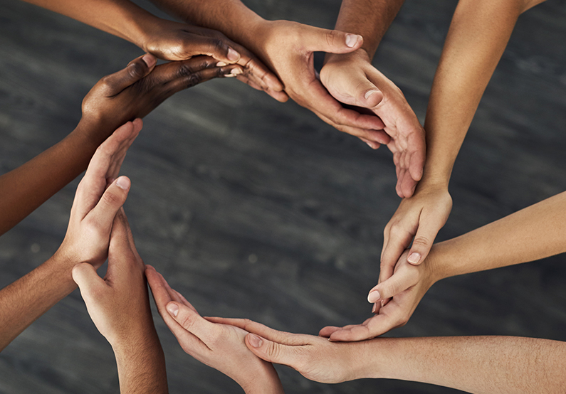 Hands forming a circle